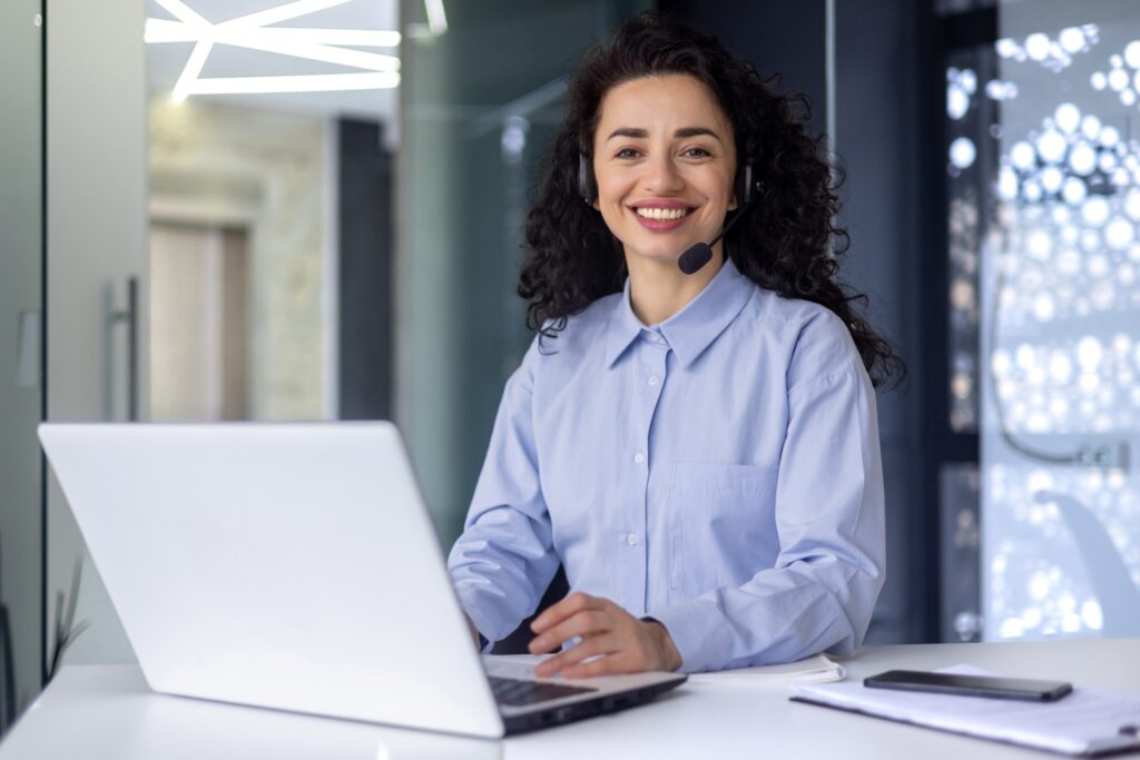 A young Muslim woman, business woman, worker of hotline, support service, hotline, emergency
